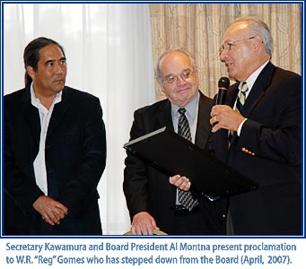 Secretary Kawamura and Board President Al Montna present proclamation to W.R. 'Reg' Gomes who has stepped down from the Board (April, '07)